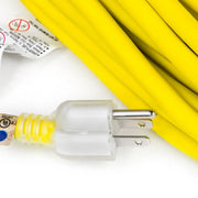 Full view of the 25-foot heavy-duty indoor and outdoor extension cord, highlighting the durable yellow vinyl jacket and reinforced plug ends.
