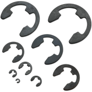 Close-up of E-clips in multiple sizes arranged by type