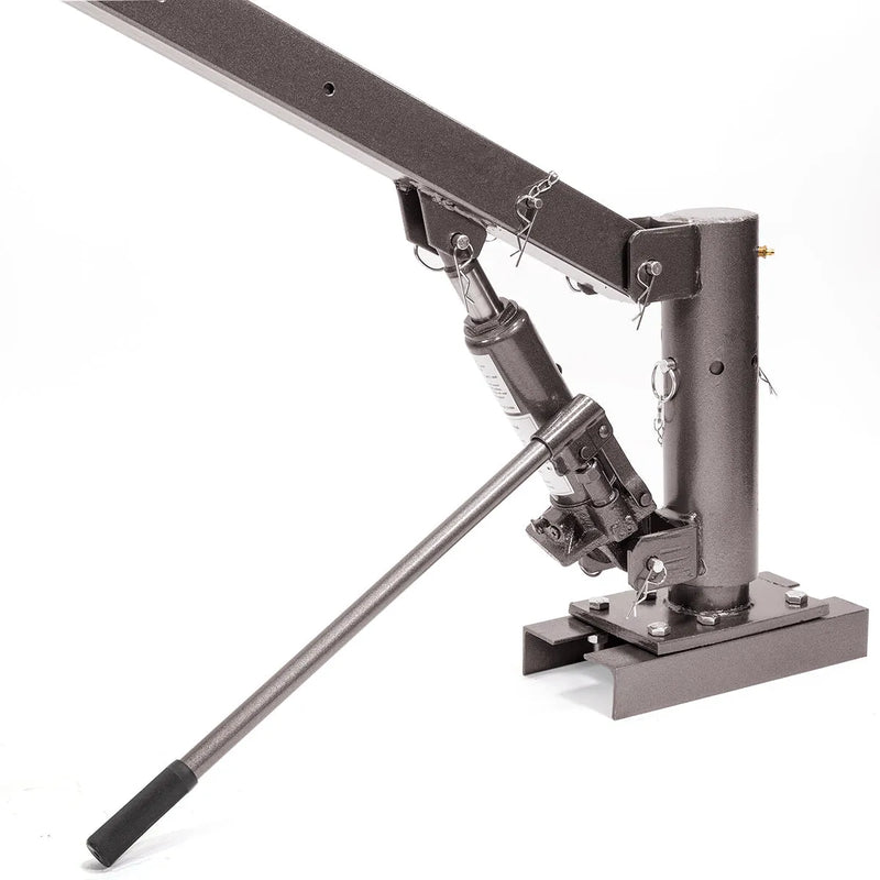 Close-up of the 3-ton hydraulic jack and 21-inch pump handle on a pickup truck crane