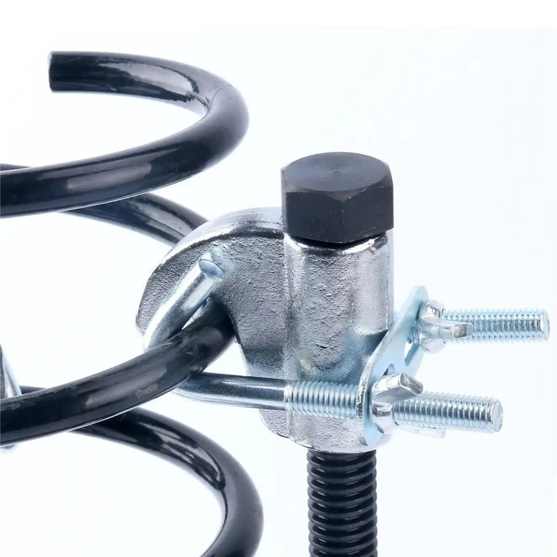 Close-up detail of the forged jaw and safety latch attached to the spring coil.