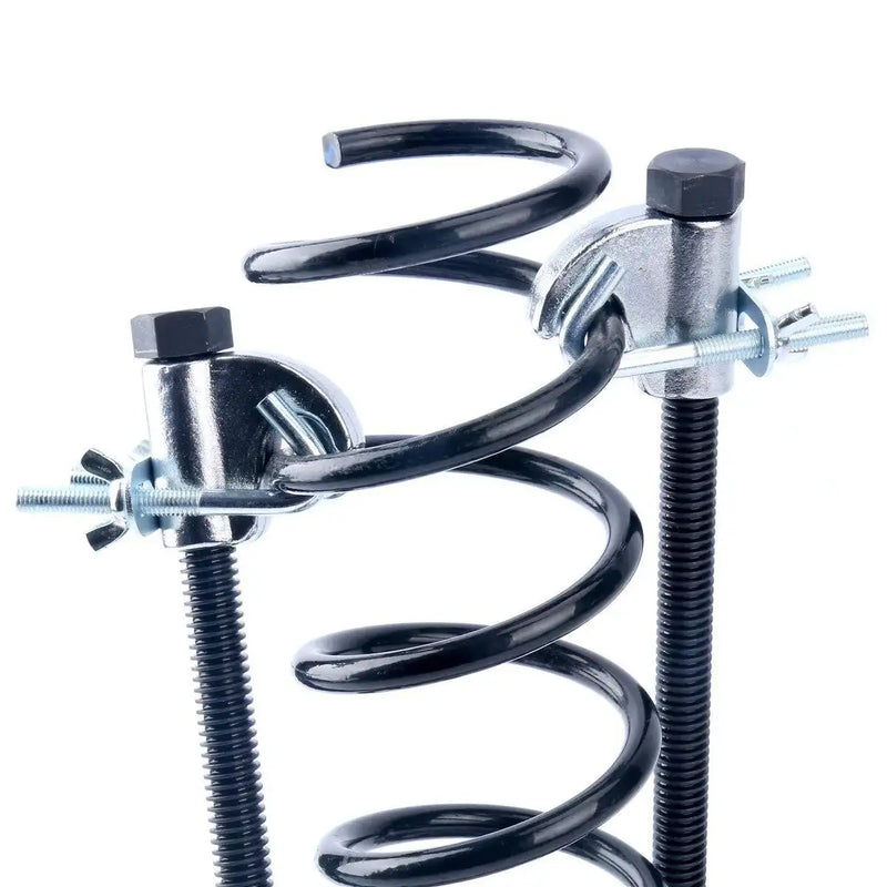 Dual compressors mounted directly onto a black coil spring.