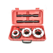 Red carrying case opened to show a 3-piece ratchet pipe threader kit, including a reversible ratchet head, two-piece handle, and three yellow dies in 1-1/4, 1-1/2, and 2 inch sizes.