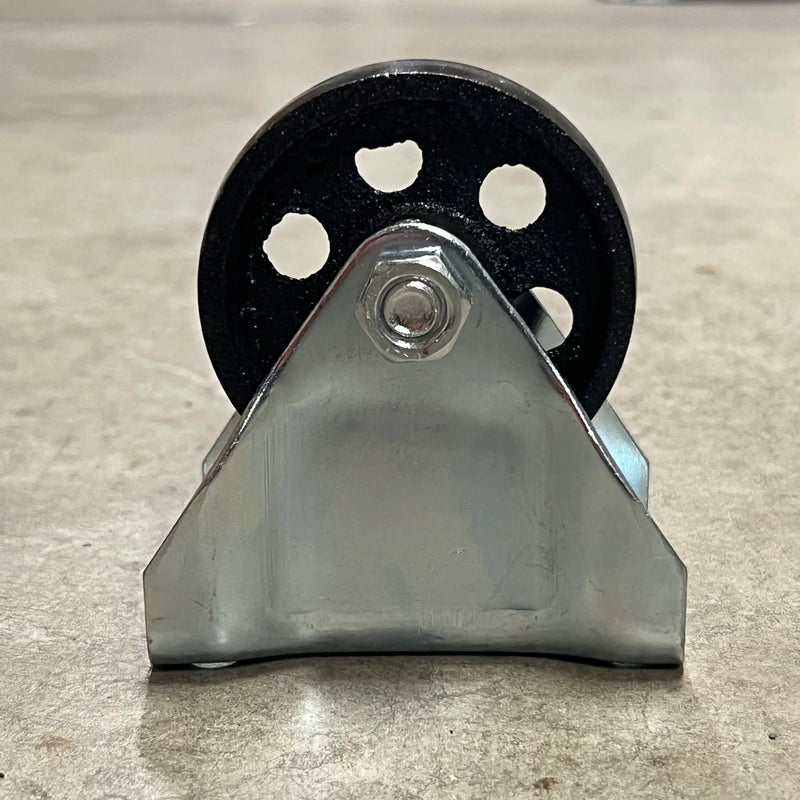 Side profile of the Steelex D4176 fixed caster showing the heavy steel support bracket and cast iron wheel.
